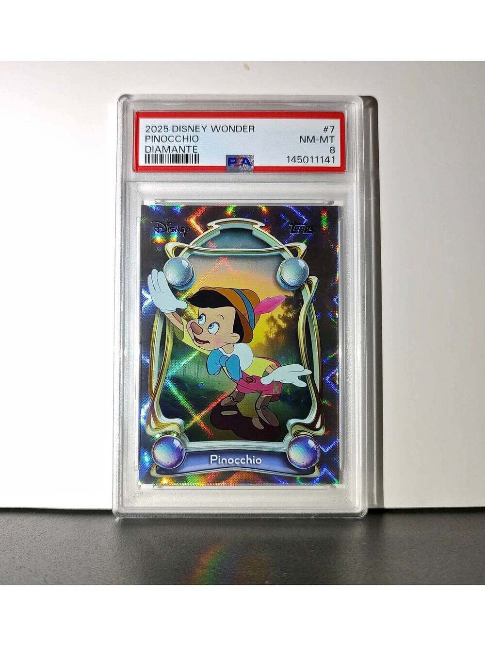 Pinocchio 2025 Topps Disney Wonder #7 Winter Variant Card Pinocchio PSA 8
